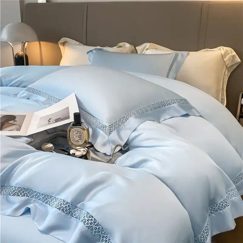 Light blue satin bedding set with delicate lace trim made from cream eucalyptus fiber for elegant bedroom comfort decorbites eucalyptus fiber