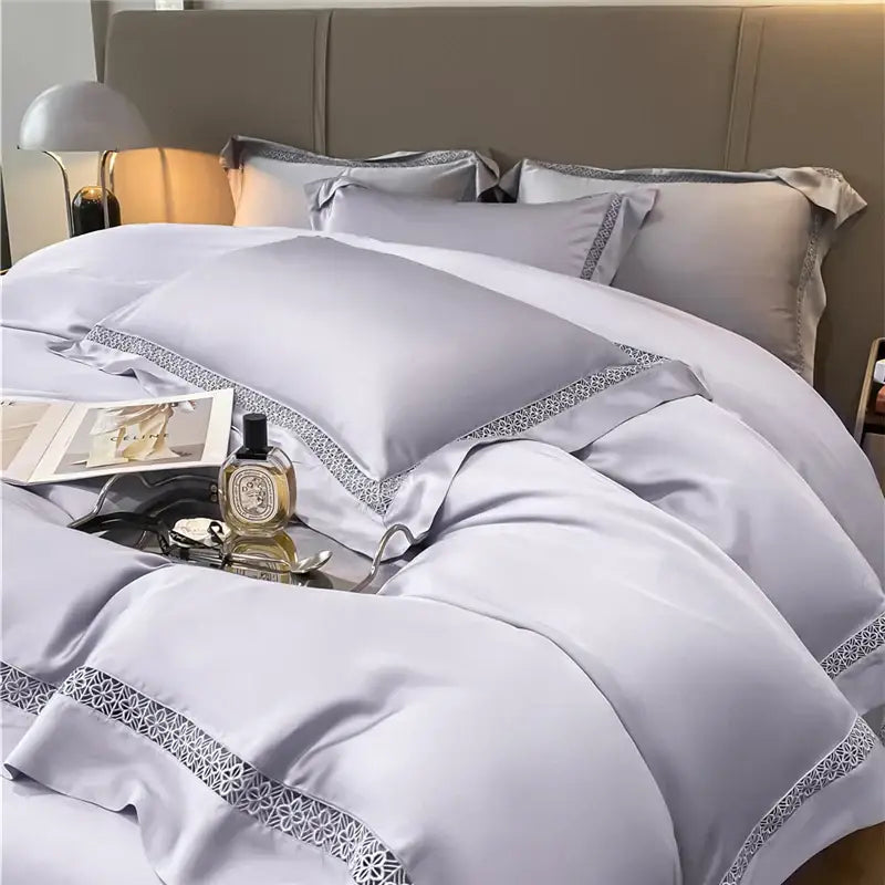 Luxurious silver-gray satin bedding set with delicate lace trim made from cream eucalyptus fiber for bedroom comfort decorbites eucalyptus fiber