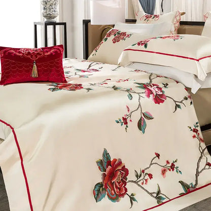 Cream floral 200s embroidery egyptian cotton bedding set with cream satin bedspread, red and green floral embroidery, and red border