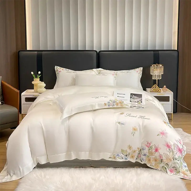 Cream floral embroidery silky duvet set in white satin with delicate pink yellow and blue decorbites flowers embroidery edges