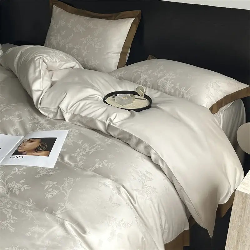 Cream floral jacquard bedding set in cream satin with subtle floral embroidery and brown piping pillowcases by decorbites