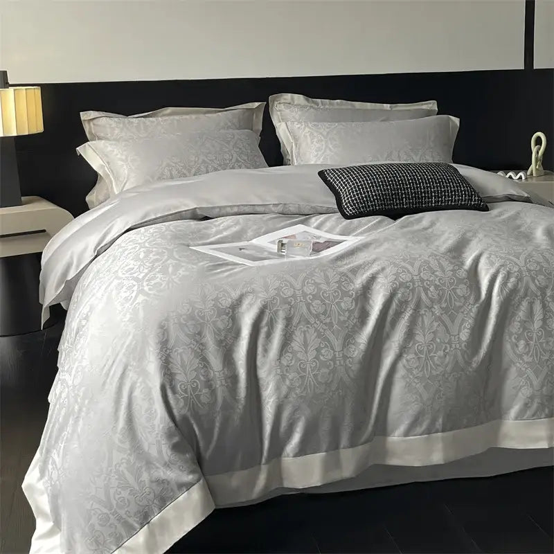 Elegant silver-gray damask decorbites jacquard bedding set with subtle sheen and crisp white piping for bedroom decor