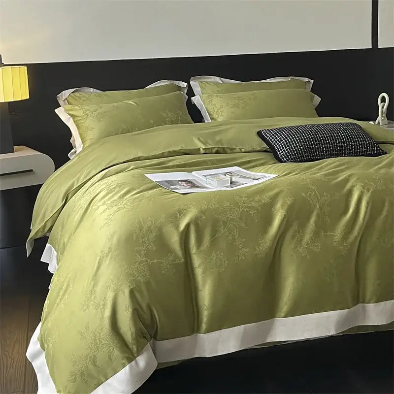 Olive green satin jacquard bedding set with subtle floral embroidery and white piping by decorbites for elegant decor