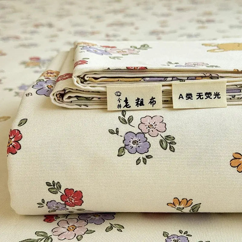 Cream flower print satin bed cover with delicate pink purple orange blossoms on cream decorbites cooling cotton fabric
