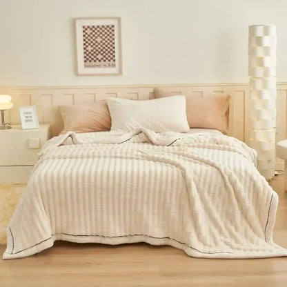 Cream cream-colored fluffy rabbit plush quilted throw blanket with subtle black piping for warm bedroom decorbites bedding