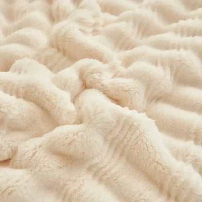 Cream fluffy rabbit plush quilted blanket with soft cream-colored plush fabric and gentle textured ripples for warm bedding