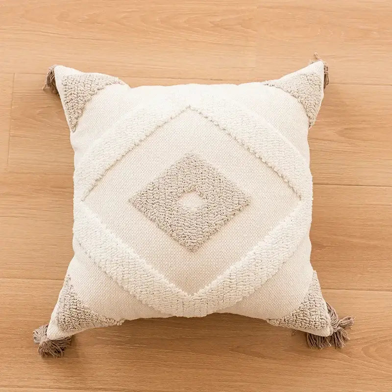 Cream pillow cover with geometric embroidered crocheted pattern and tassels for living room decorbites decor