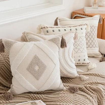 Cream geometric embroidered crocheted pillow cover with textured patterns and beige tassels for living room decorbites decor