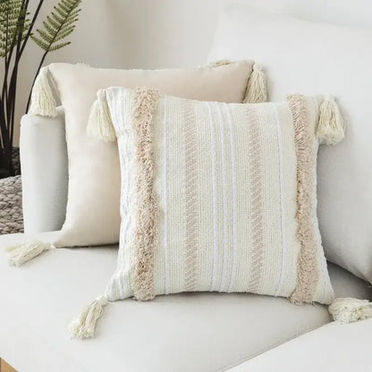 Beige woven cushion cover with vertical striped pattern fringed tassels and decorbites geometric embroidery detail