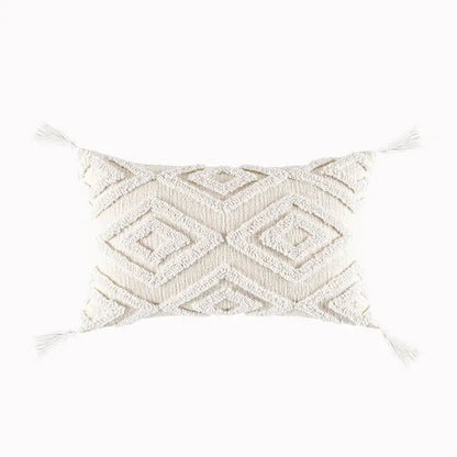 Cream cushion cover with geometric embroidery and textured tassels at corners for living room decorbites geometric embroidery
