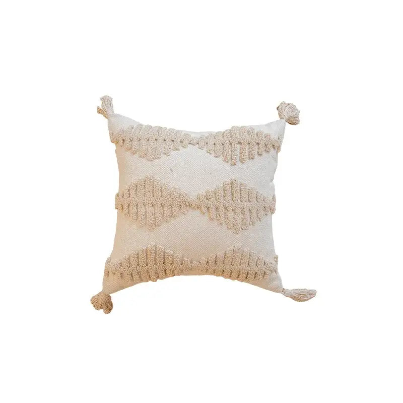 Cream geometric tufted cushion cover with beige woven patterns and tassels by decorbites for living room decor