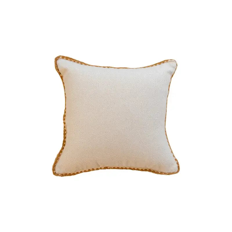 Cream geometric tufted cushion cover with textured fabric and gold-toned braided trim for living room decorbites cushion cover