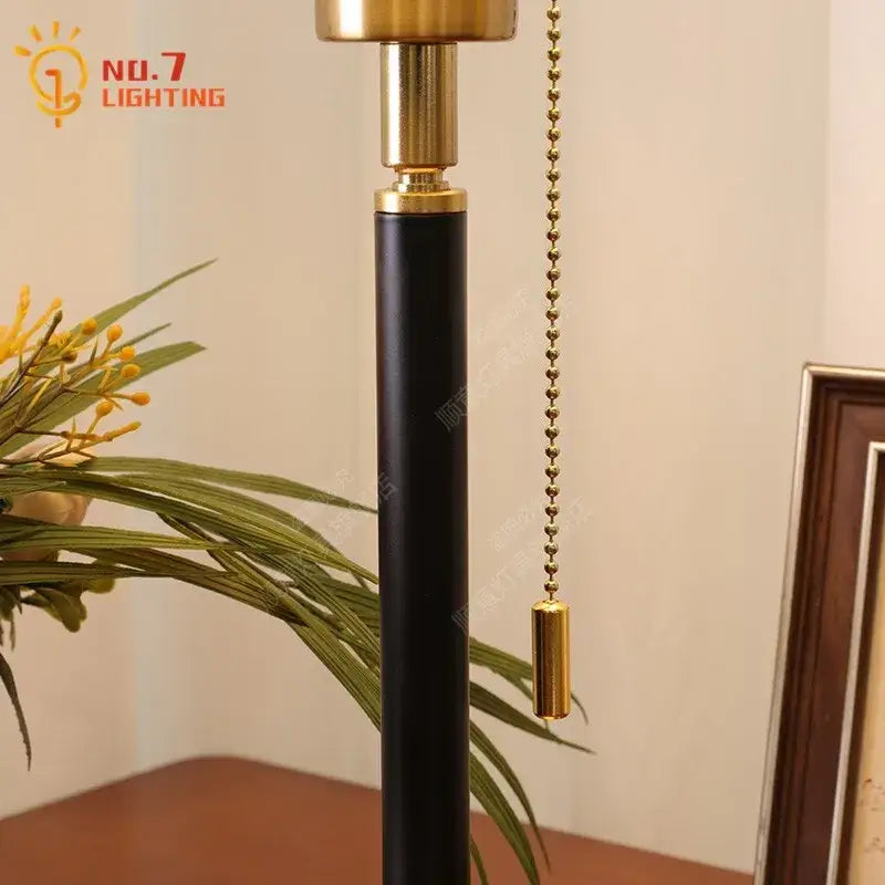 Black and gold cream glass mushroom table lamp with sleek cylindrical design for bedroom decorbites cream glass decor