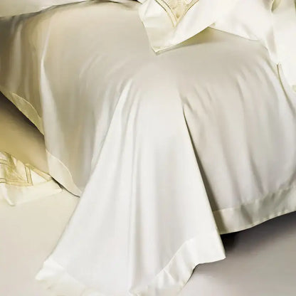 Cream gold wide edge embroidery bedding set featuring a cream satin bedspread with delicate gold embroidery decorbites two sizes