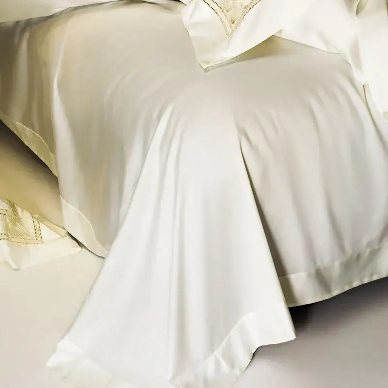 Cream gold wide edge embroidery bedding set featuring a cream satin bedspread with delicate gold embroidery decorbites two sizes