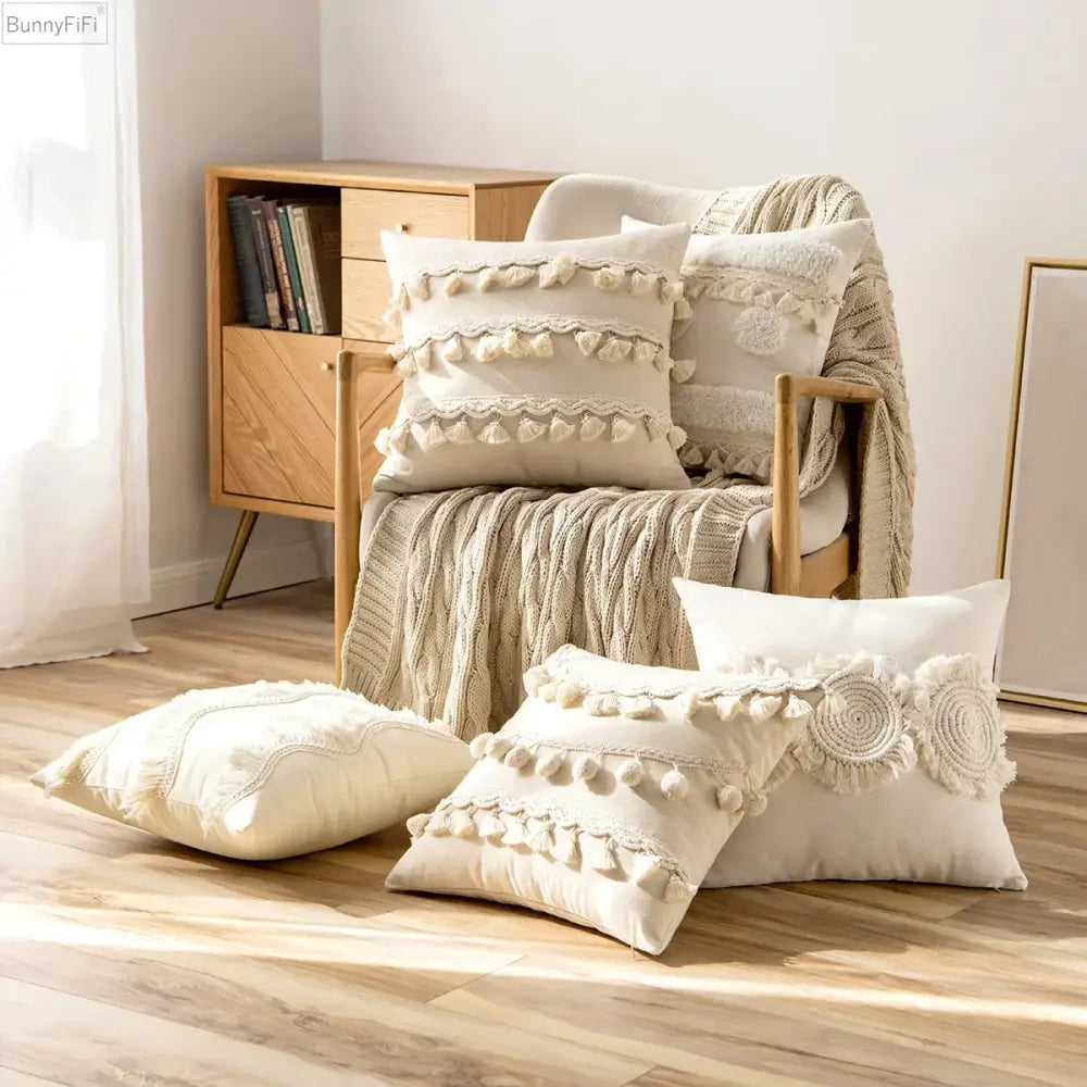 Cream ivory pompom tassel pillow cover with textured tassels and crochet lace decor for living room use