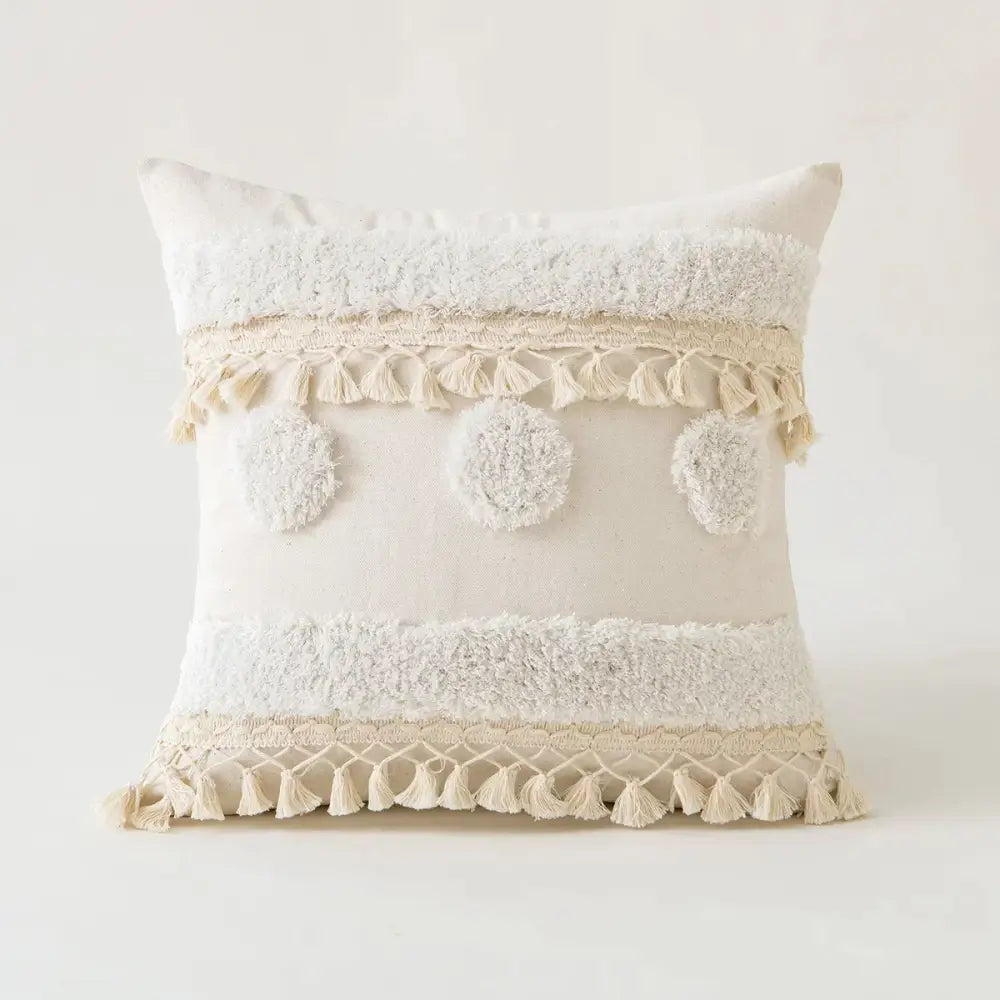 Cream ivory pompom tassel pillow cover with textured fabric, tassels, and three fluffy pom-poms for living room decorbites decor