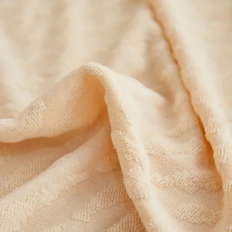Cream jacquard l sofa seat cover in cream textured fabric with raised woven pattern for living room sofa cover