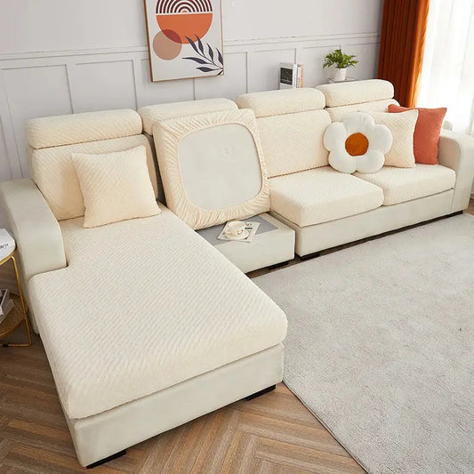 Cream jacquard l sofa seat cover in cream stretch fabric with subtle ribbed texture snugly fitted over sectional sofa
