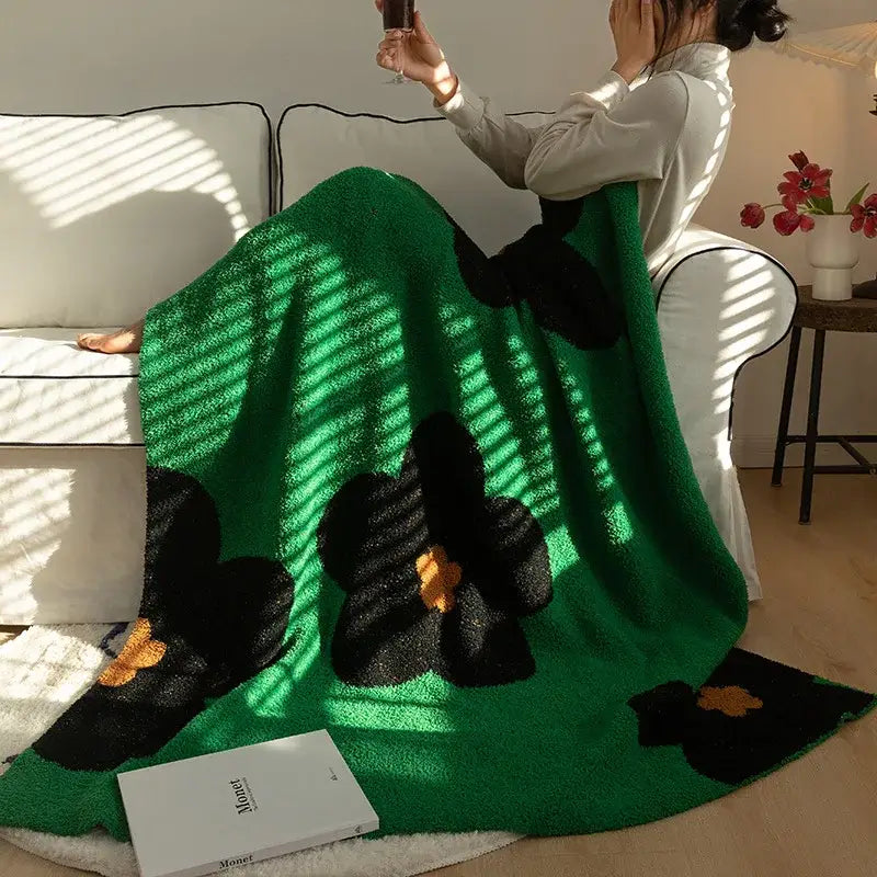 Vibrant green plush korean kawaii flower blanket with bold black and orange floral patterns for bedroom decorbites decor