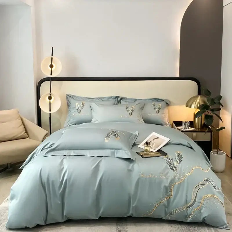 Light blue satin bed linens with delicate gold leaf decorbites cotton embroidery for elegant bedroom decor