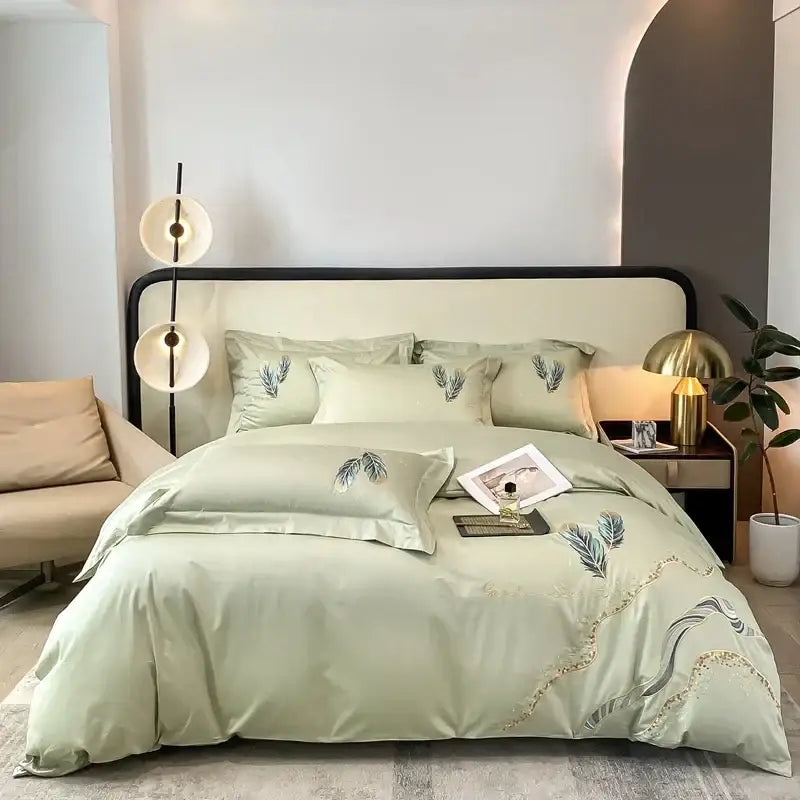 Soft sage green satin duvet set with delicate cream leaf cotton embroidery bed linens for elegant bedroom decorbites decor