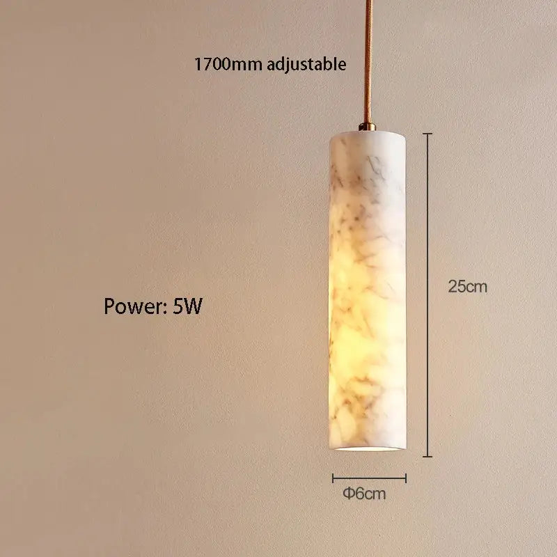 Cream marble cylinder pendant light with warm glowing interior for luxury bedroom and bar counter decorbites cream marble