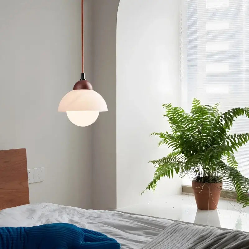 A cream marble led pendant light with copper stem and dual-layer glass shade for bedroom decorbites cream marble