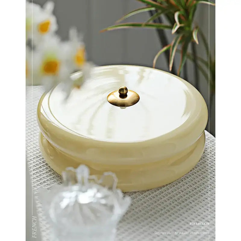 Cream medieval glass ceiling lamp for living room with cream-colored ceramic storage box and gold-toned lid decorbites cream medieval