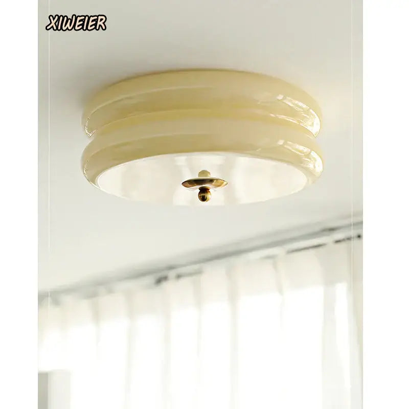 Cream medieval glass ceiling lamp with layered cream-colored glass and brass-toned fixture for living room decorbites ceiling lamp