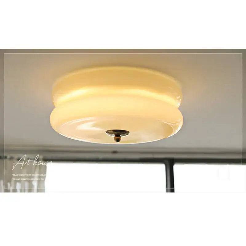 Cream medieval glass ceiling lamp with warm frosted glass and brass-toned fixture for living room decorbites cream medieval