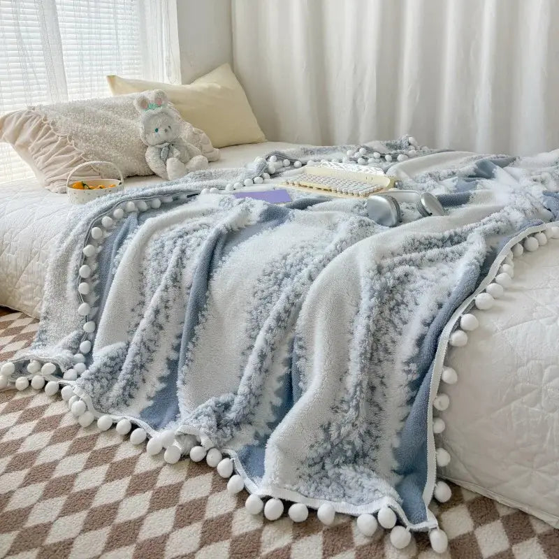 Soft blue and white plush throw blanket with fluffy ball lace trim featuring decorbites jacquard fluffy design