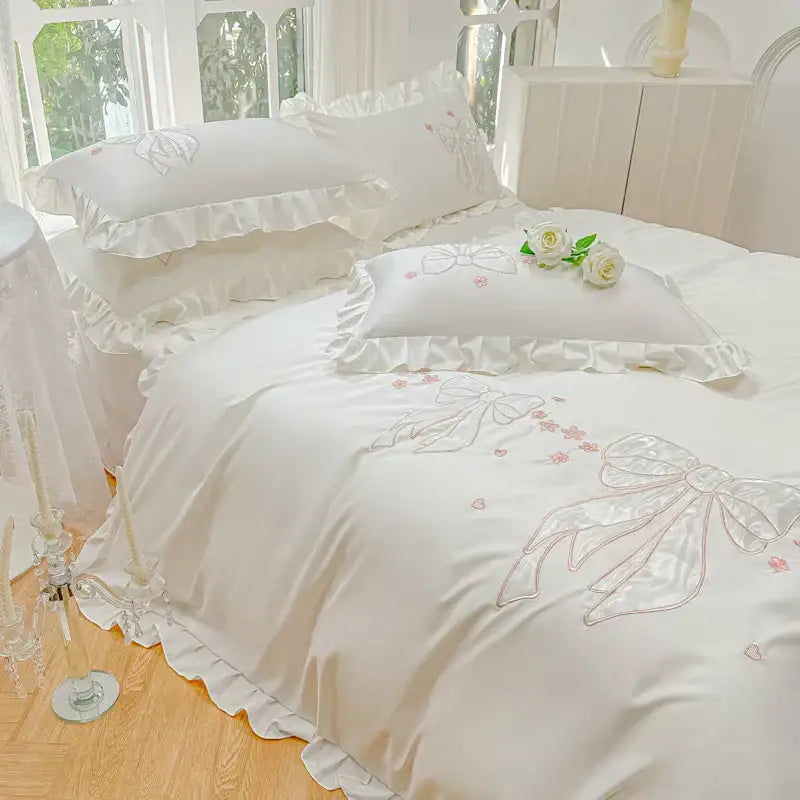 Cream and pink ice silk duvet set with white satin fabric embroidered ruffles and delicate pink bows
