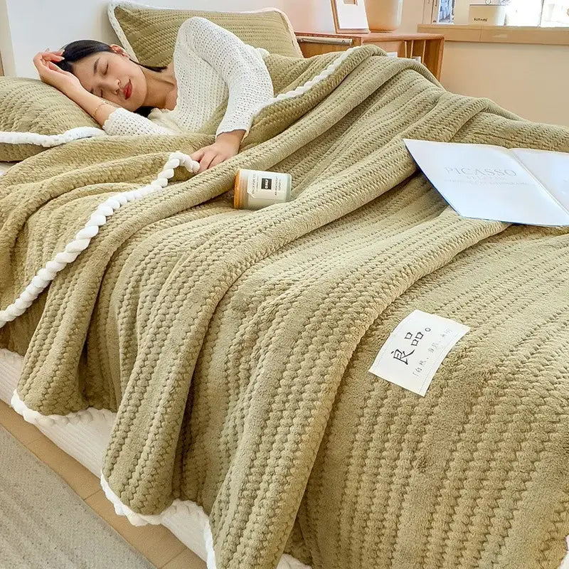 Soft olive green double sided jacquard milk velvet blanket with white braided trim and plush inner lining for bedroom use