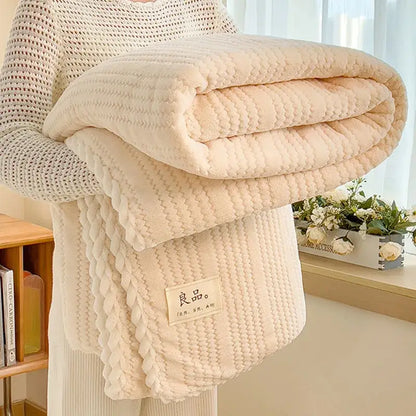Cream plush double sided jacquard milk velvet blanket with textured woven pattern and embroidered label for bedroom throw
