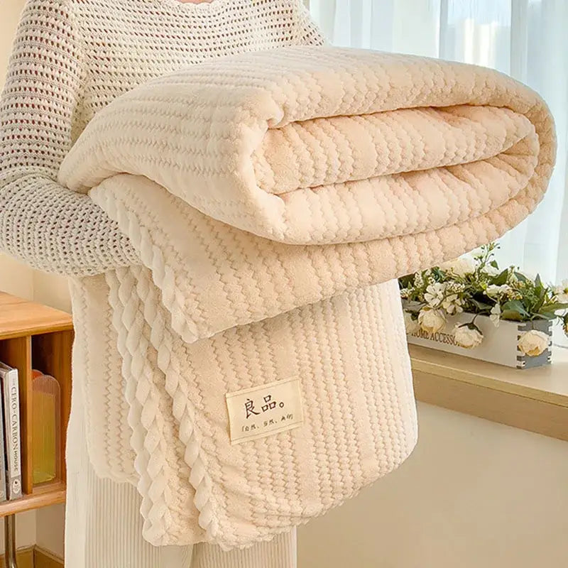 Cream plush double sided jacquard milk velvet blanket with textured woven pattern and embroidered label for bedroom throw