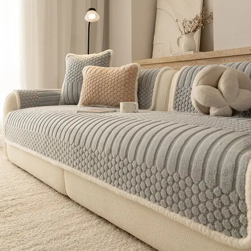 Cream plush loop yarn jacquard knit gray sofa slipcover with quilted pattern and cream fleece trim for living room use