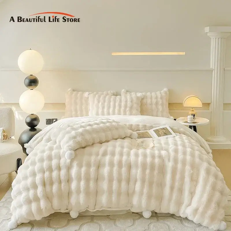 Cream plush rabbit fur bedding set featuring a cream-colored, soft, fluffy bedding set with matching pillowcases