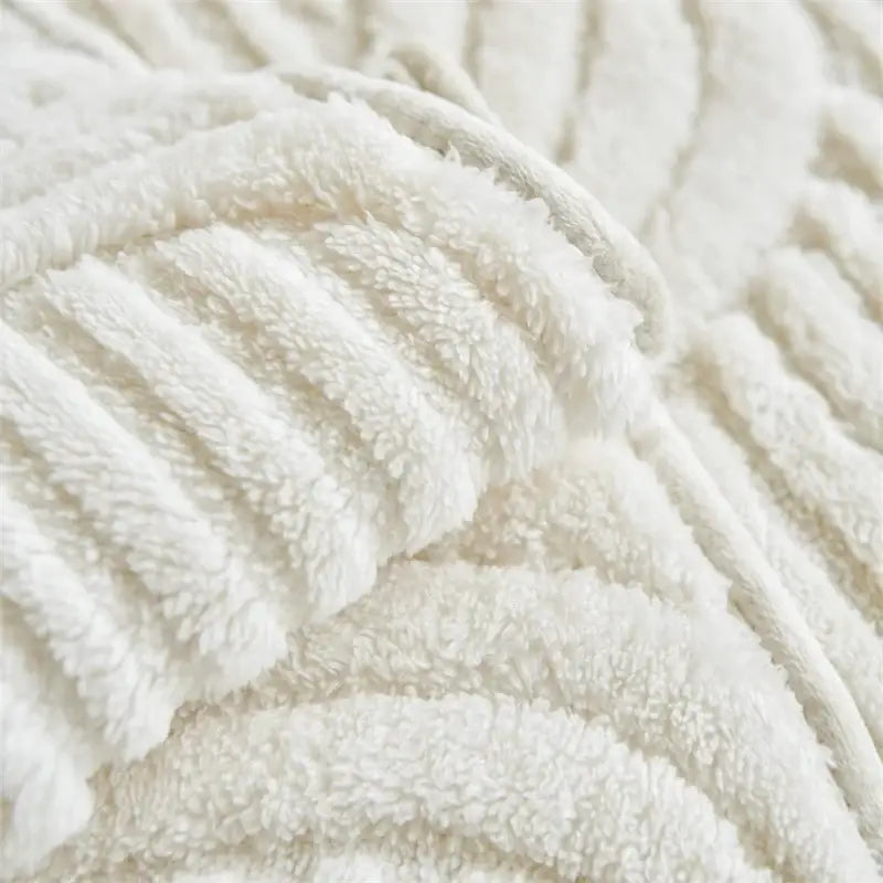 Cream quilted wave plush sofa cover in cream color with a ribbed textured surface for living room cushions