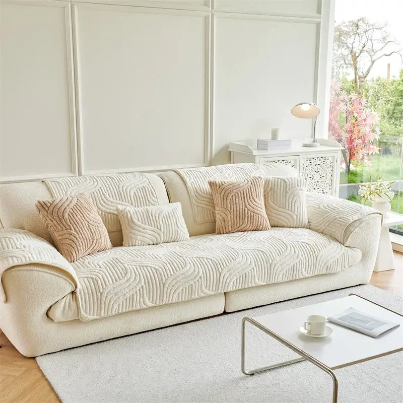 Cream-colored quilted wave plush sofa cover with a soft textured pattern for living room cushions