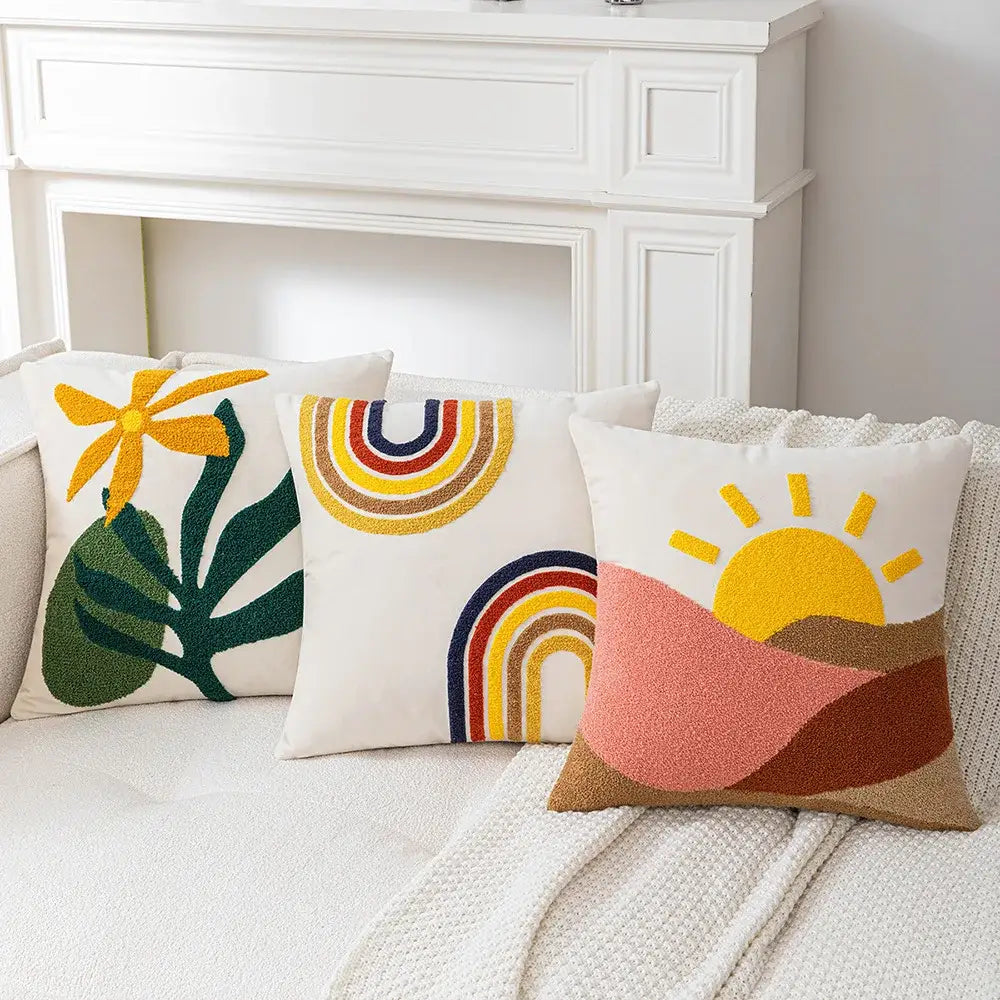 Three embroidered cream rainbow cartoon abstract embroidery cushion covers with colorful floral and sun motifs for living room decorbites cartoon abstract decor
