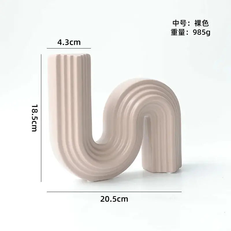Beige decorbites geometric ceramic s shape vase with vertical ridges for living room decor and modern elegance