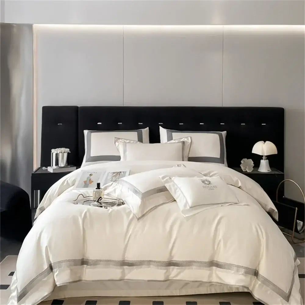 Cream satin 1000tc egyptian cotton bedding set with silver piping and embroidered logo on pillowcases by decorbites