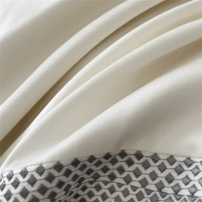 Cream satin 1000tc Egyptian cotton bedding set with gray and white geometric pattern and silver piping decorbites 1000tc Egyptian