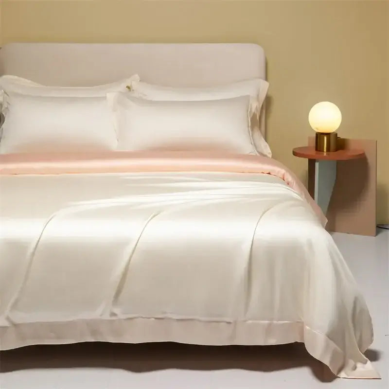 Cream satin 120s natural fabric bedding set with cream-colored satin duvet cover and subtle pink inner lining for cooling sheets