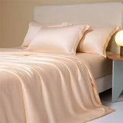 Cream satin 120s natural fabric bedding set with matching pillows and smooth glossy finish for bedroom cooling comfort
