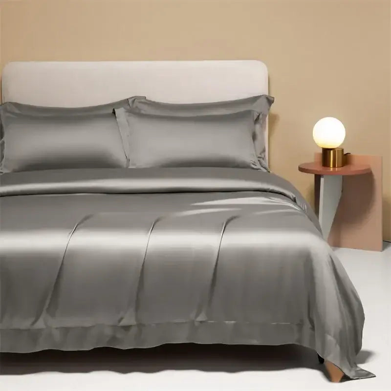 Gray satin duvet cover set with matching pillowcases featuring pleats in decorbites 120s natural fabric bedding set