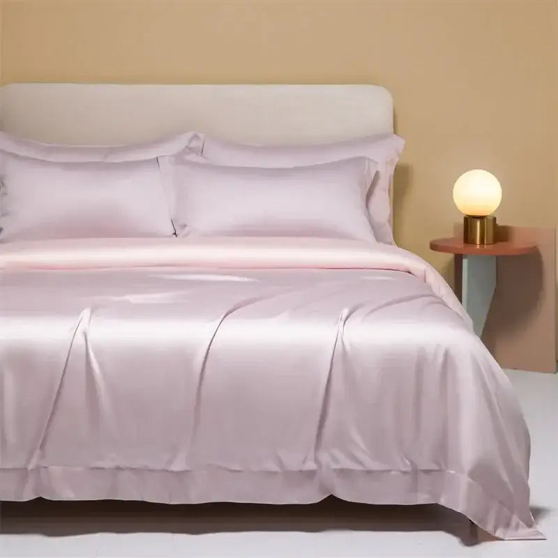 A soft lavender satin bedding set with ruffled edges made of decorbites 120s natural fabric for cooling comfort