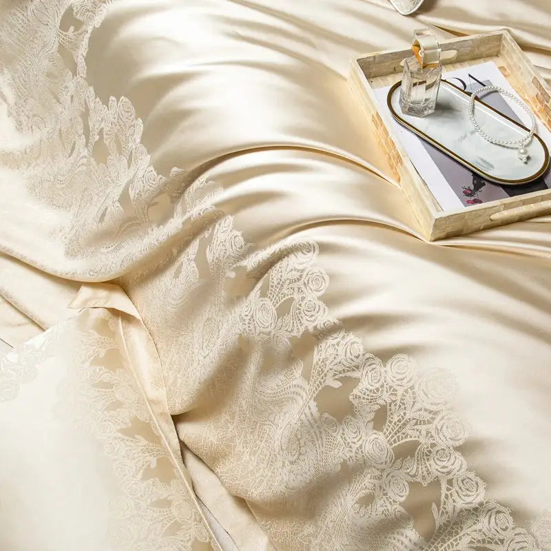 Cream satin jacquard egyptian cotton bedding set featuring cream satin bedsheet with white lace floral embroidery edges
