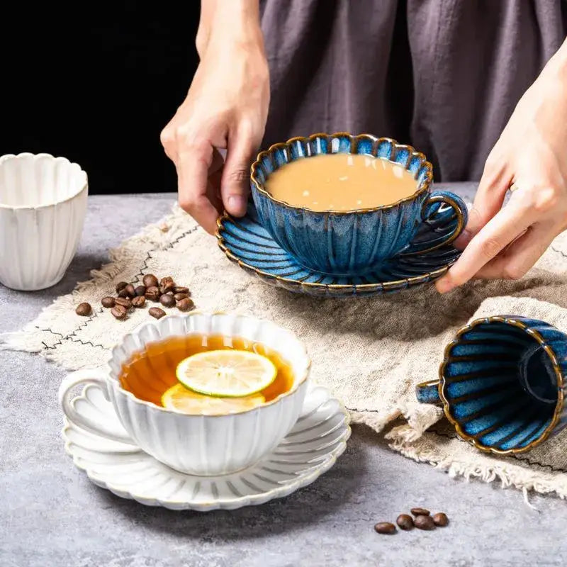 Deep blue ceramic afternoon tea cup and saucer with gold-trimmed scalloped rim and handle by decorbites ceramic afternoon set